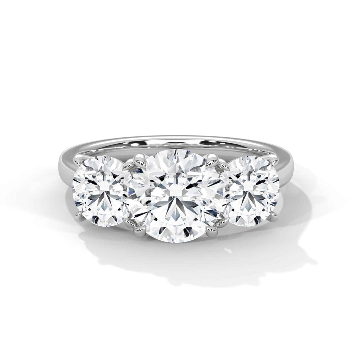 Three-Stone Round Cut Diamond Engagement Ring with Cathedral