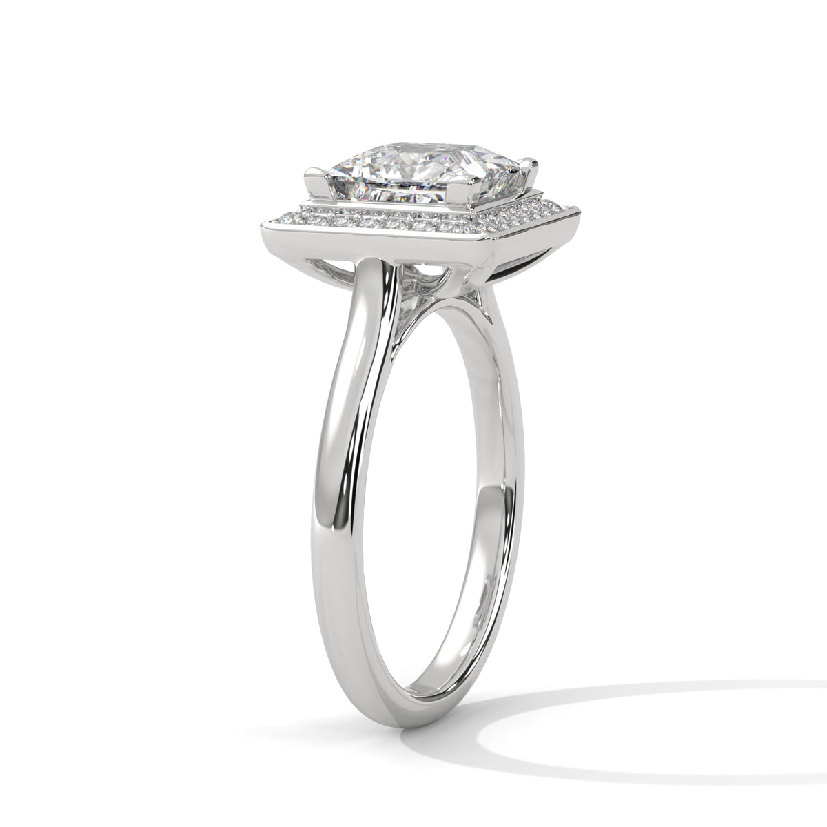 Diamond ring with a white gold band on a white background