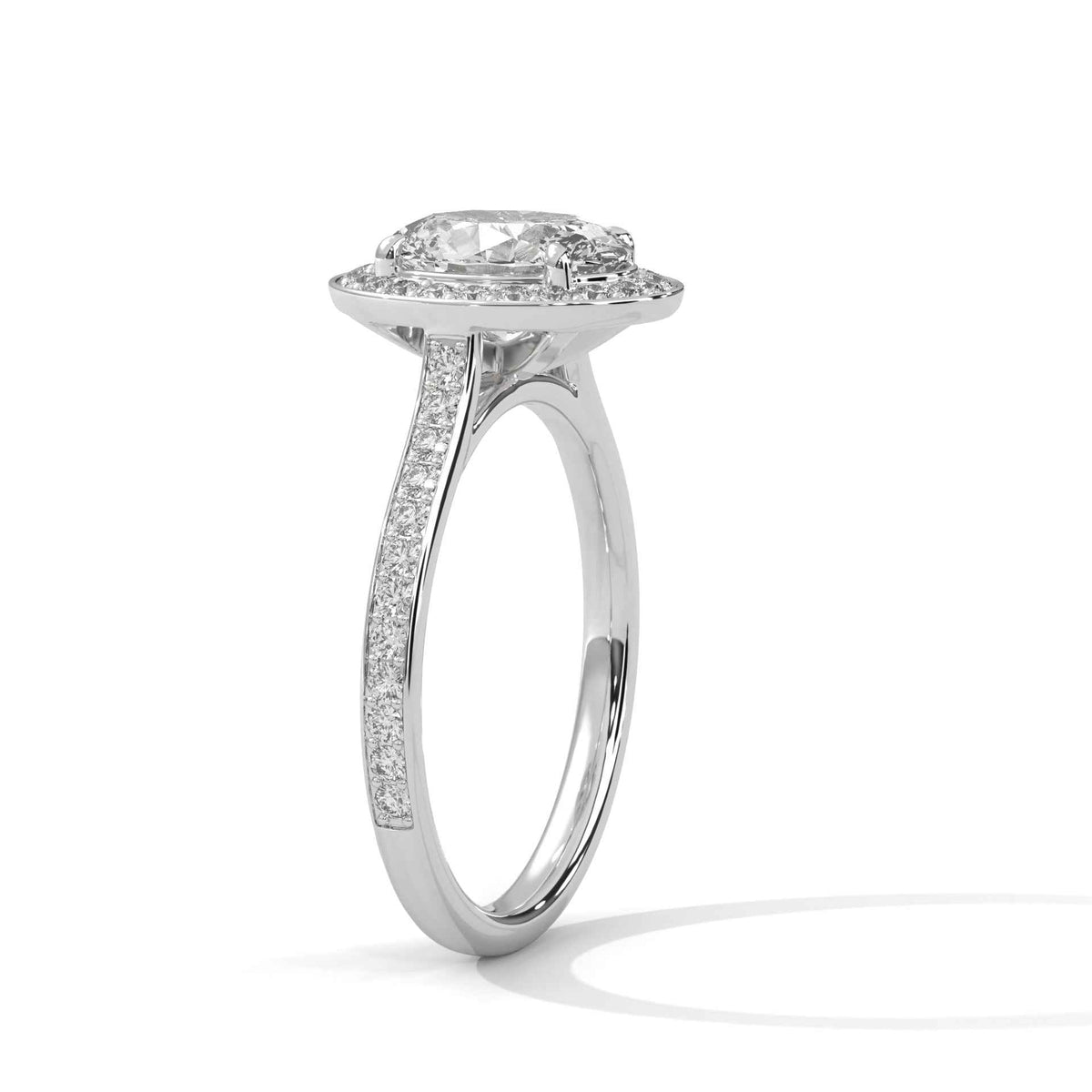 Oval Cut Diamond Halo Engagement Ring with Sparkling Pavé Band