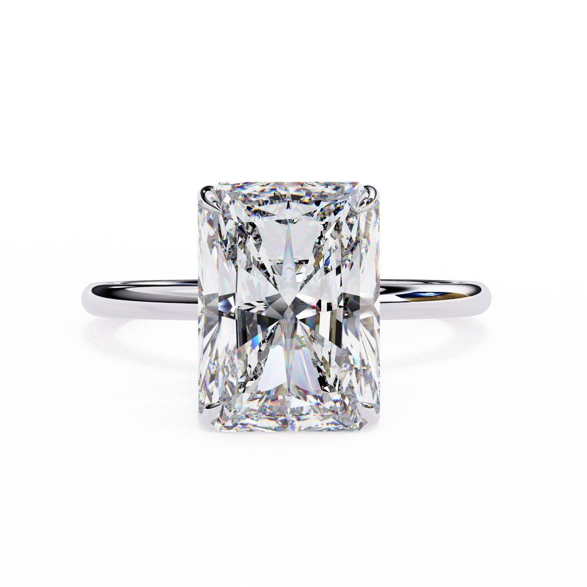 Diamond ring with a rectangular cut gemstone on a white background