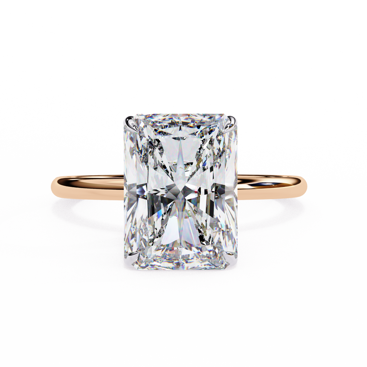Rose gold ring with a large rectangular diamond on a white background