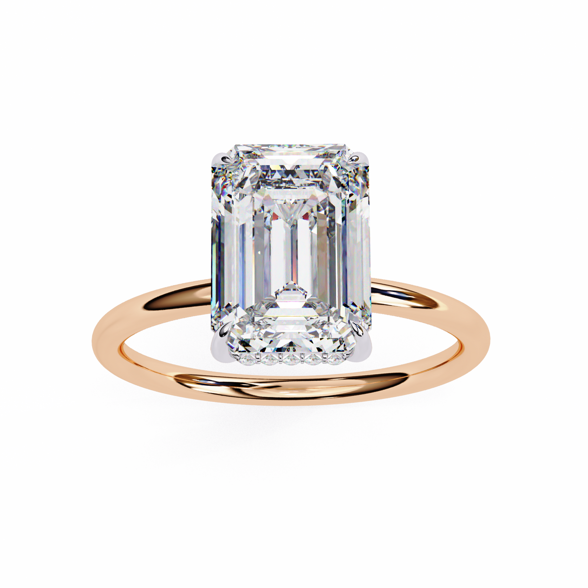 Rose gold ring with a large emerald-cut diamond on a white background