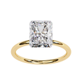 Gold ring with a large diamond on a white background
