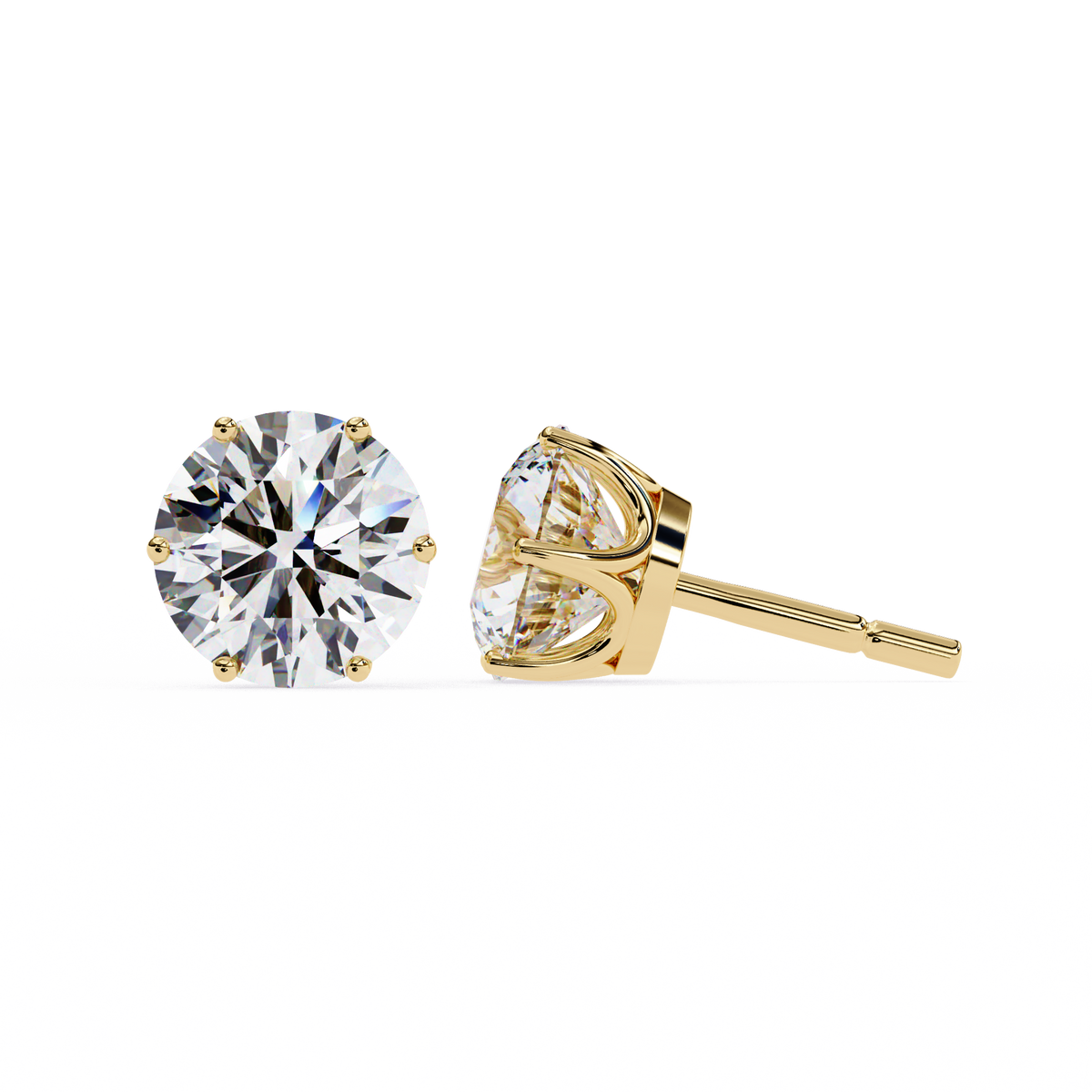 Gold stud earrings with clear gemstones on a white background