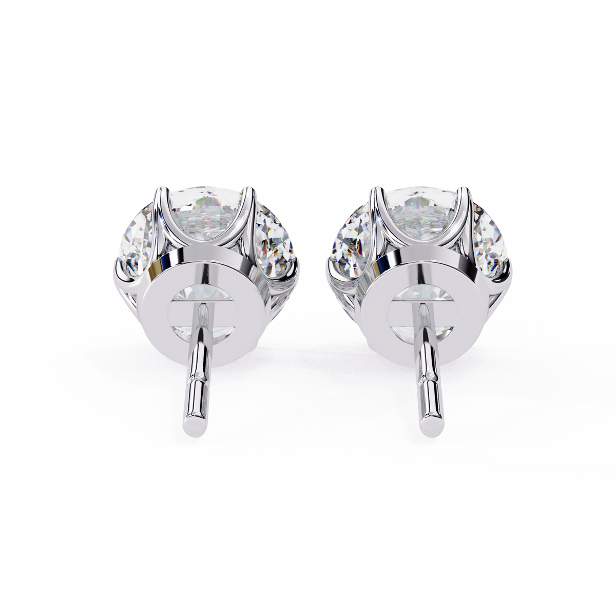 Pair of silver earrings with clear gemstones on a white background