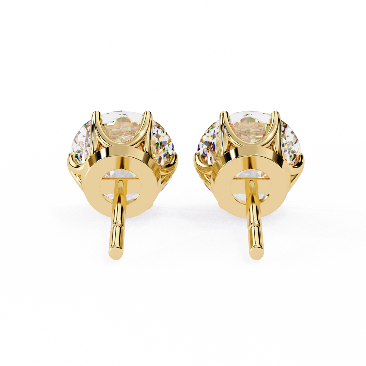 Gold earrings with clear gemstones on a white background
