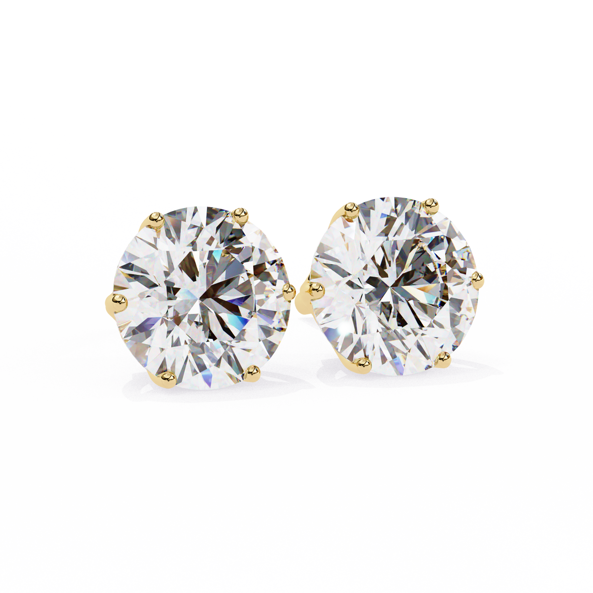 Pair of diamond stud earrings on a white background