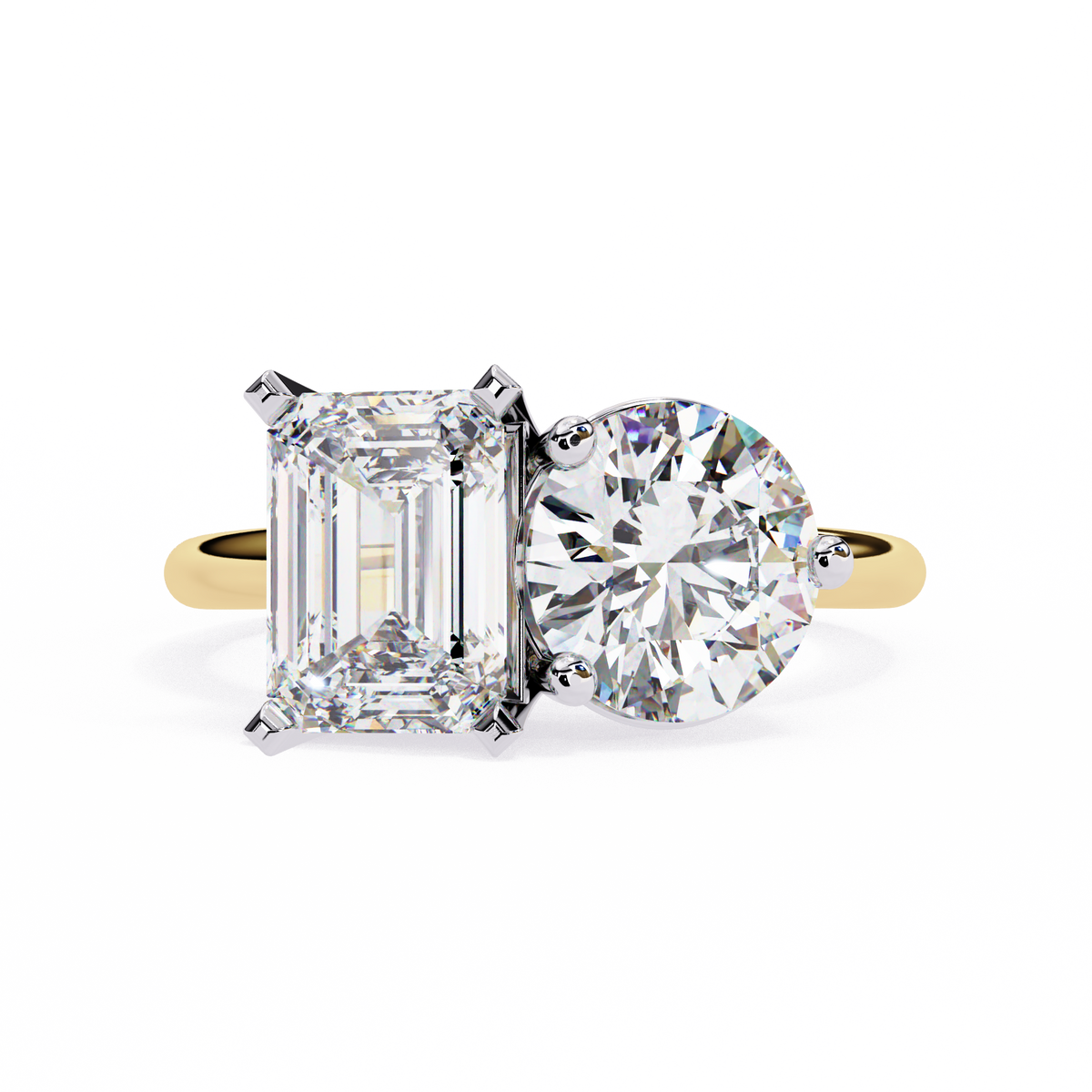 Diamond ring with emerald-cut and round-cut diamonds on a white background
