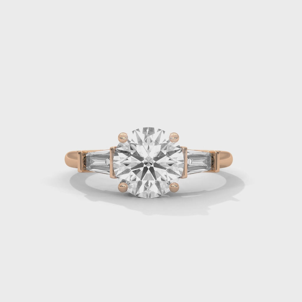 Round Three-Stone Engagement Ring with Tapered Baguettes