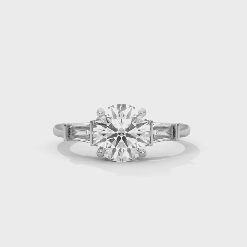 Round Three-Stone Engagement Ring with Tapered Baguettes