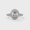 Gold ring with a large diamond and smaller diamonds on a white background