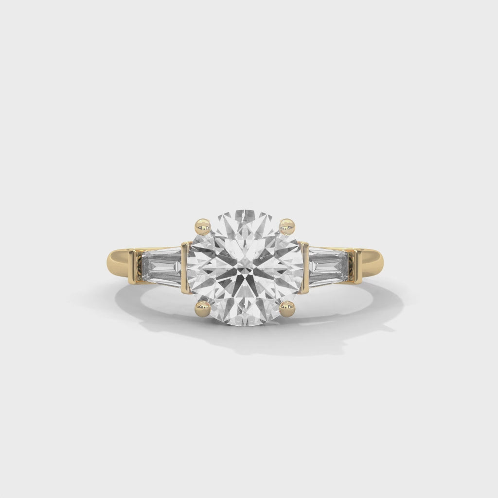 Round Three-Stone Engagement Ring with Tapered Baguettes
